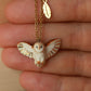 Barn owl necklace with a feather charm