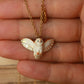 Barn owl necklace with a feather charm