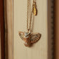 Eagle owl necklace with a feather charm