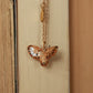 Eagle owl necklace with a feather charm