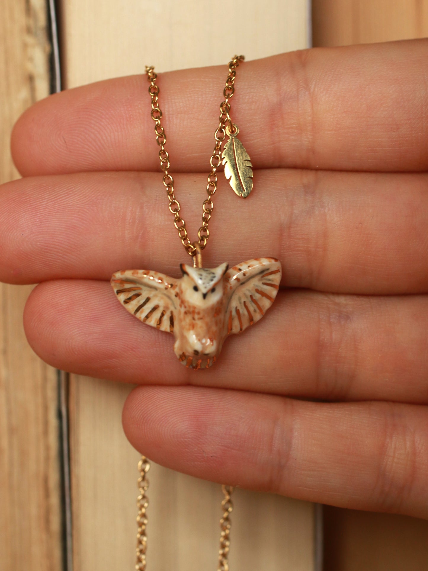 Eagle owl necklace with a feather charm