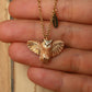 Eagle owl necklace with a feather charm