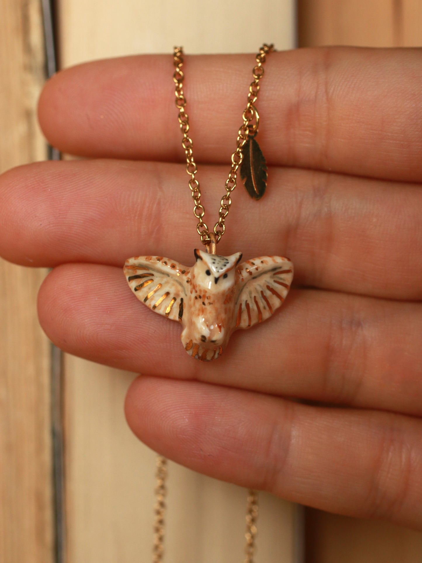 Eagle owl necklace with a feather charm