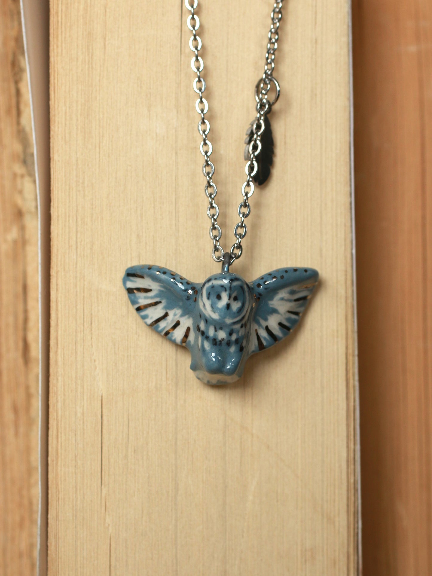 Great grey owl necklace with a feather charm