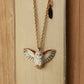 Barn owl necklace with a feather charm