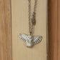 Snowy owl necklace with a feather charm