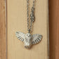 Snowy owl necklace with a feather charm