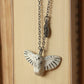 Snowy owl necklace with a feather charm