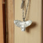 Snowy owl necklace with a feather charm