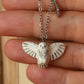 Snowy owl necklace with a feather charm