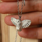 Snowy owl necklace with a feather charm
