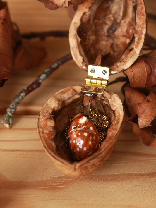 Sleeping Fawn necklace in a walnut box
