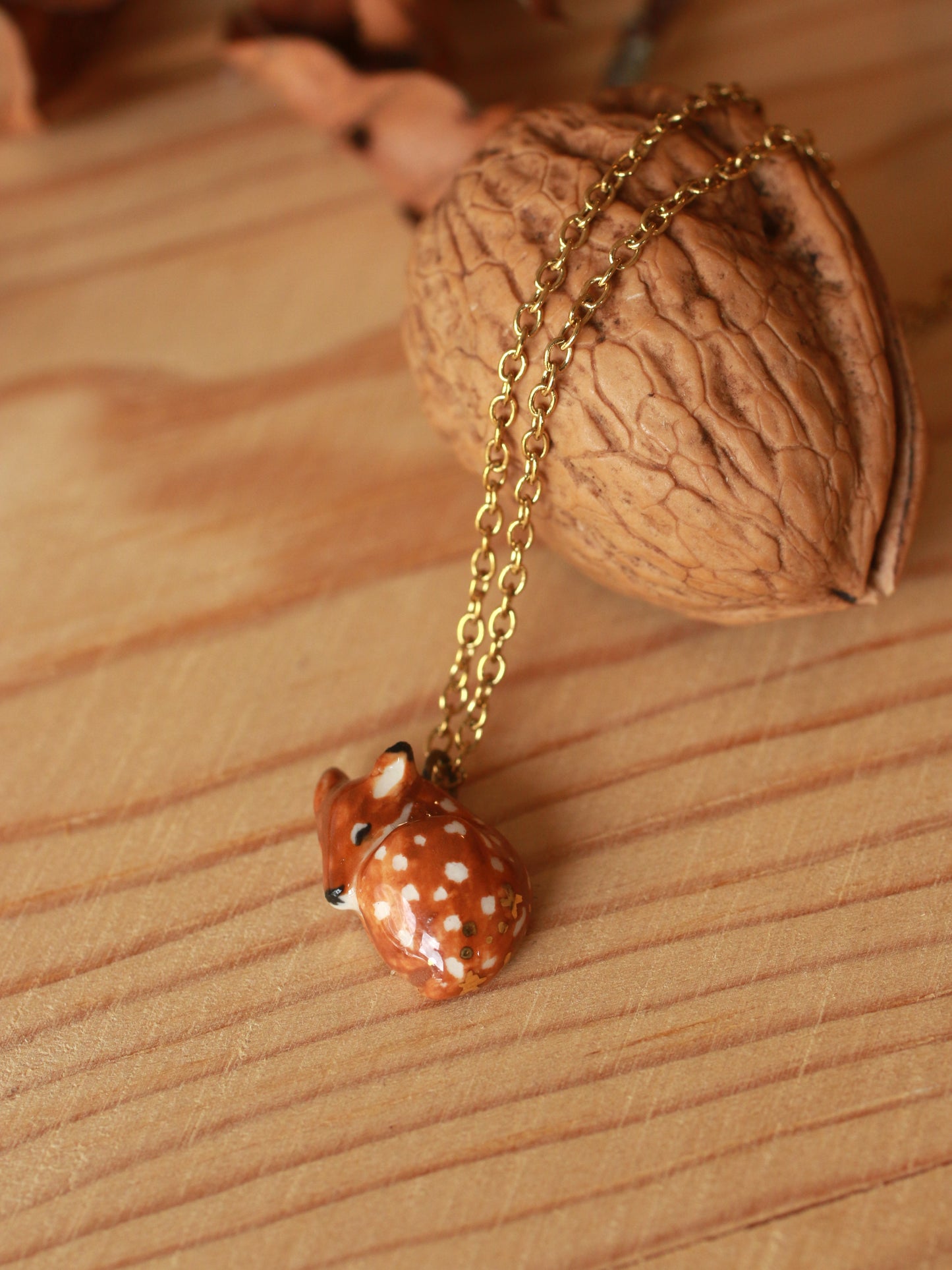 Sleeping Fawn necklace in a walnut box