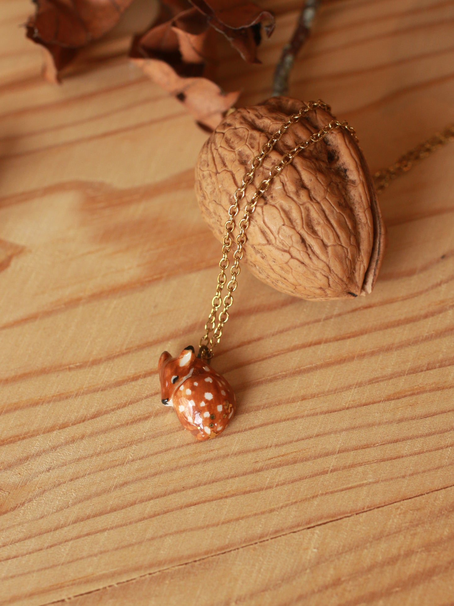 Sleeping Fawn necklace in a walnut box