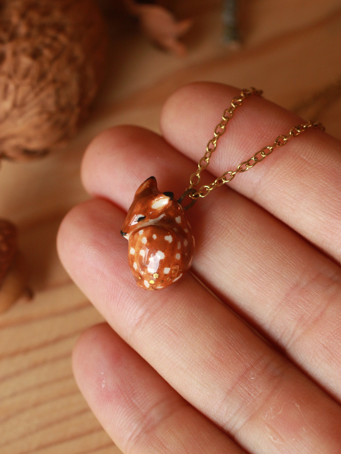 Sleeping Fawn necklace in a walnut box