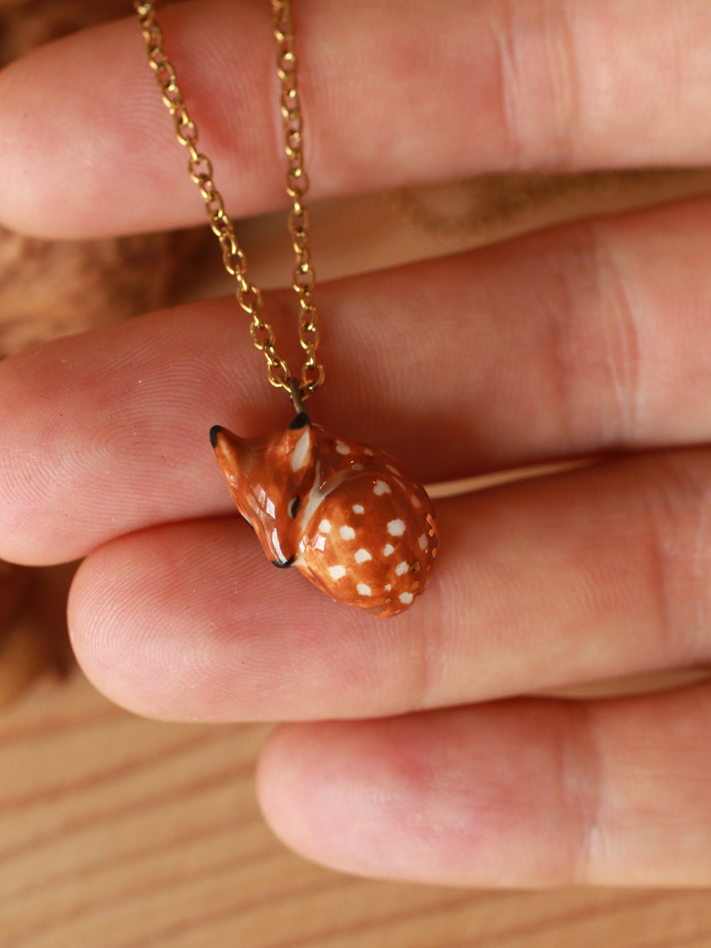 Sleeping Fawn necklace in a walnut box