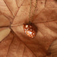 Sleeping Fawn necklace in a walnut box