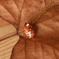 Sleeping Fawn necklace in a walnut box