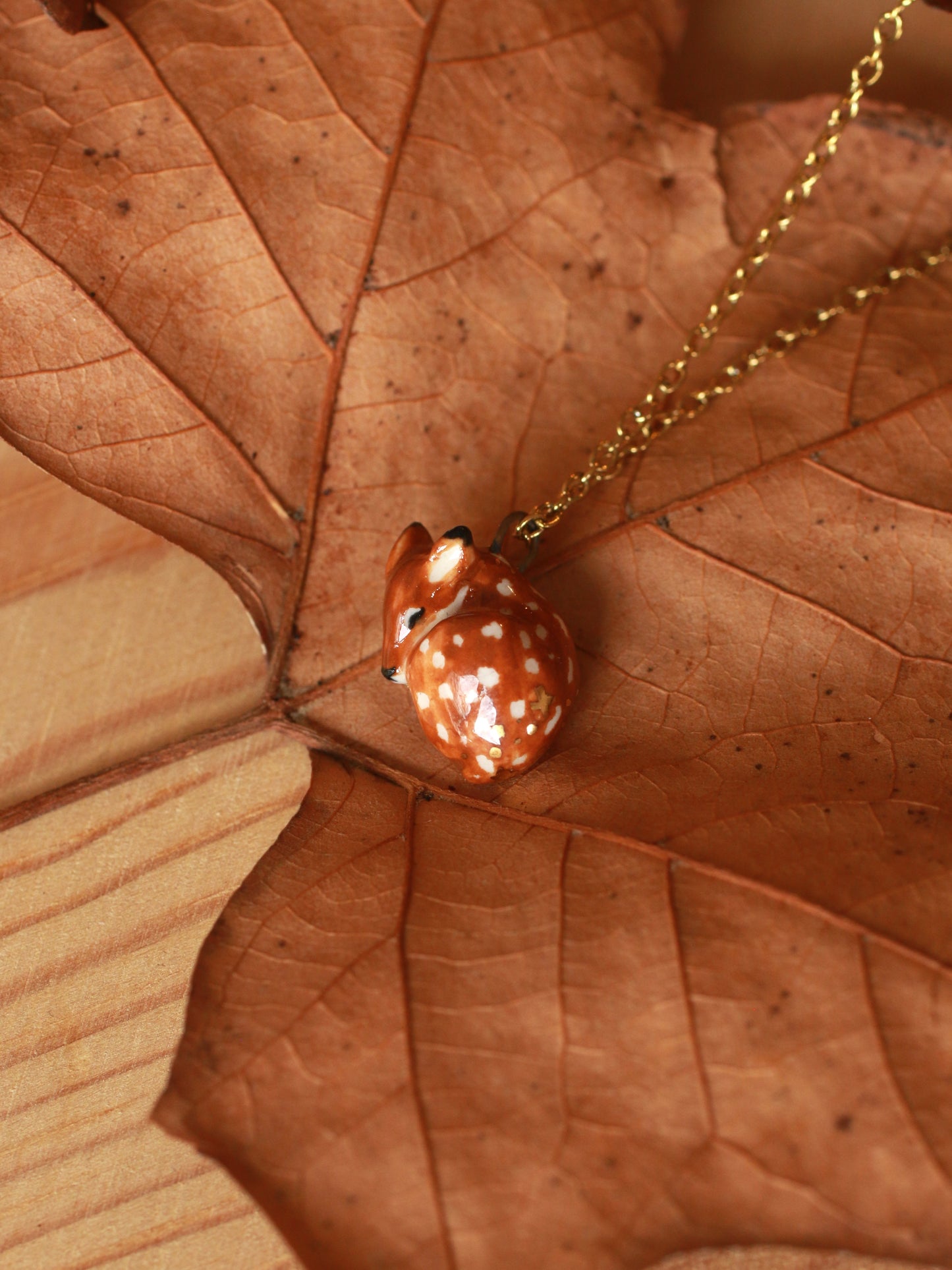 Sleeping Fawn necklace in a walnut box