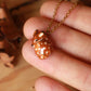 Sleeping Fawn necklace in a walnut box