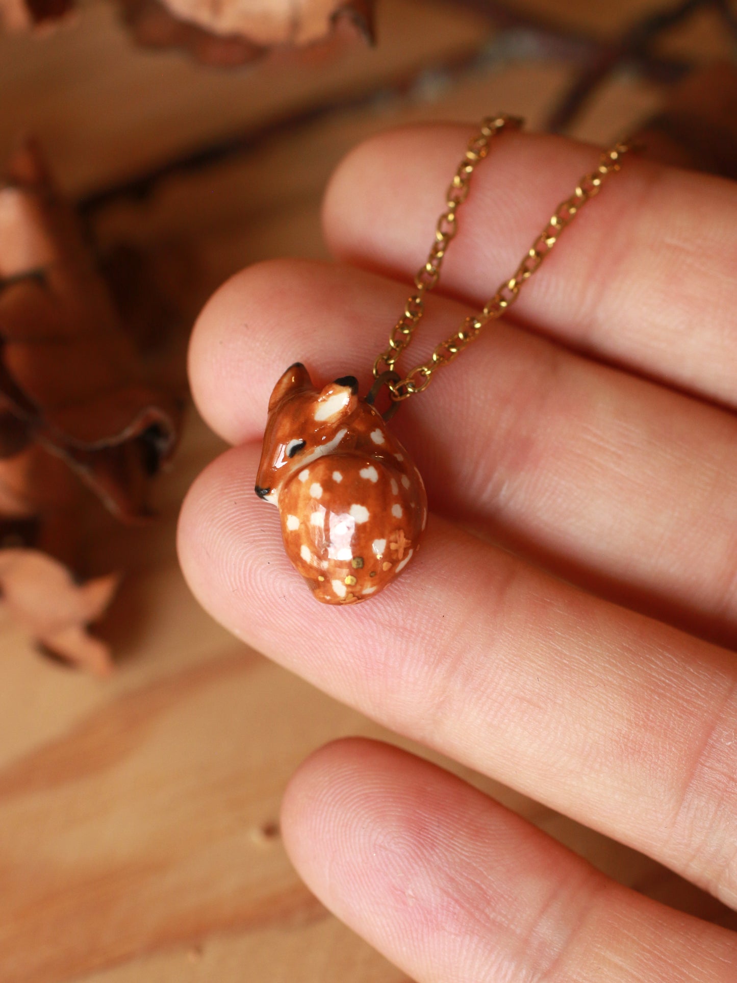 Sleeping Fawn necklace in a walnut box