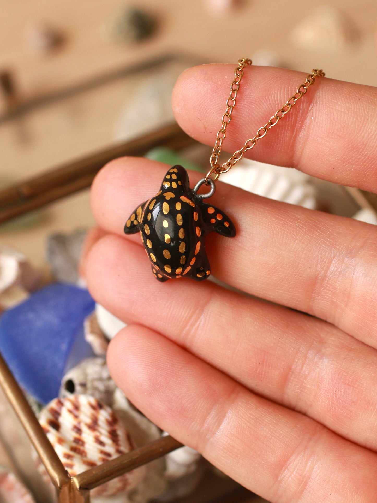 Ceramic black sea turtle necklace -  with 22k gold details