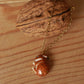 Sleeping bunny necklace in a walnut box