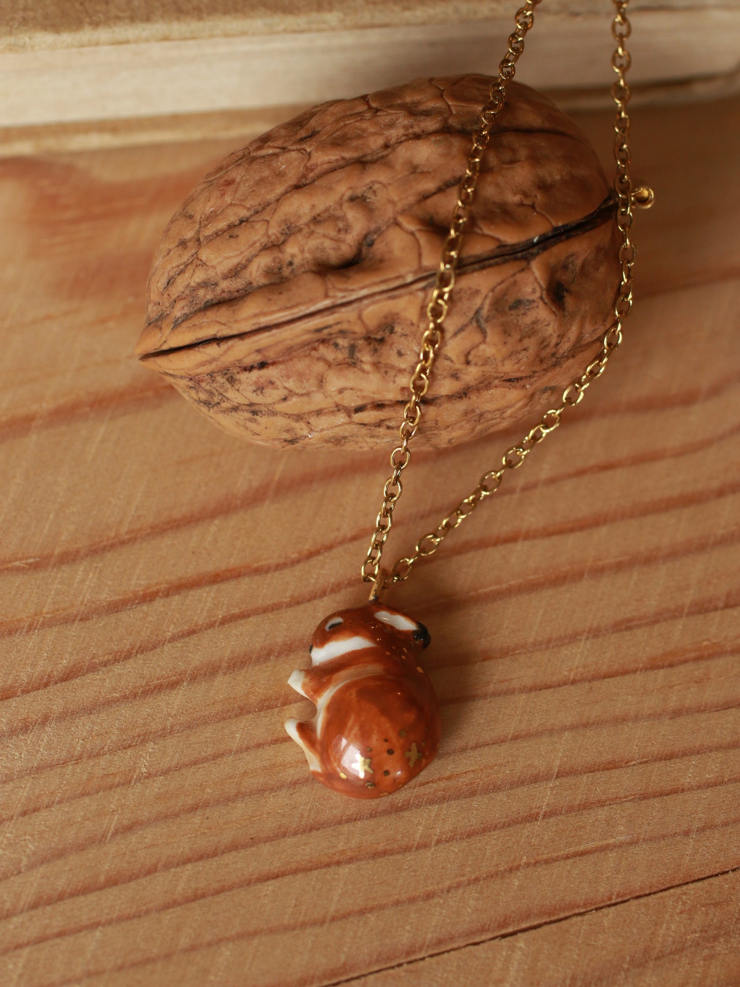 Sleeping bunny necklace in a walnut box