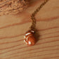 Sleeping bunny necklace in a walnut box