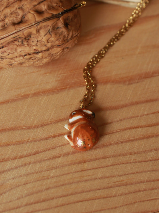 Sleeping bunny necklace in a walnut box