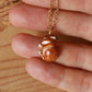 Sleeping bunny necklace in a walnut box