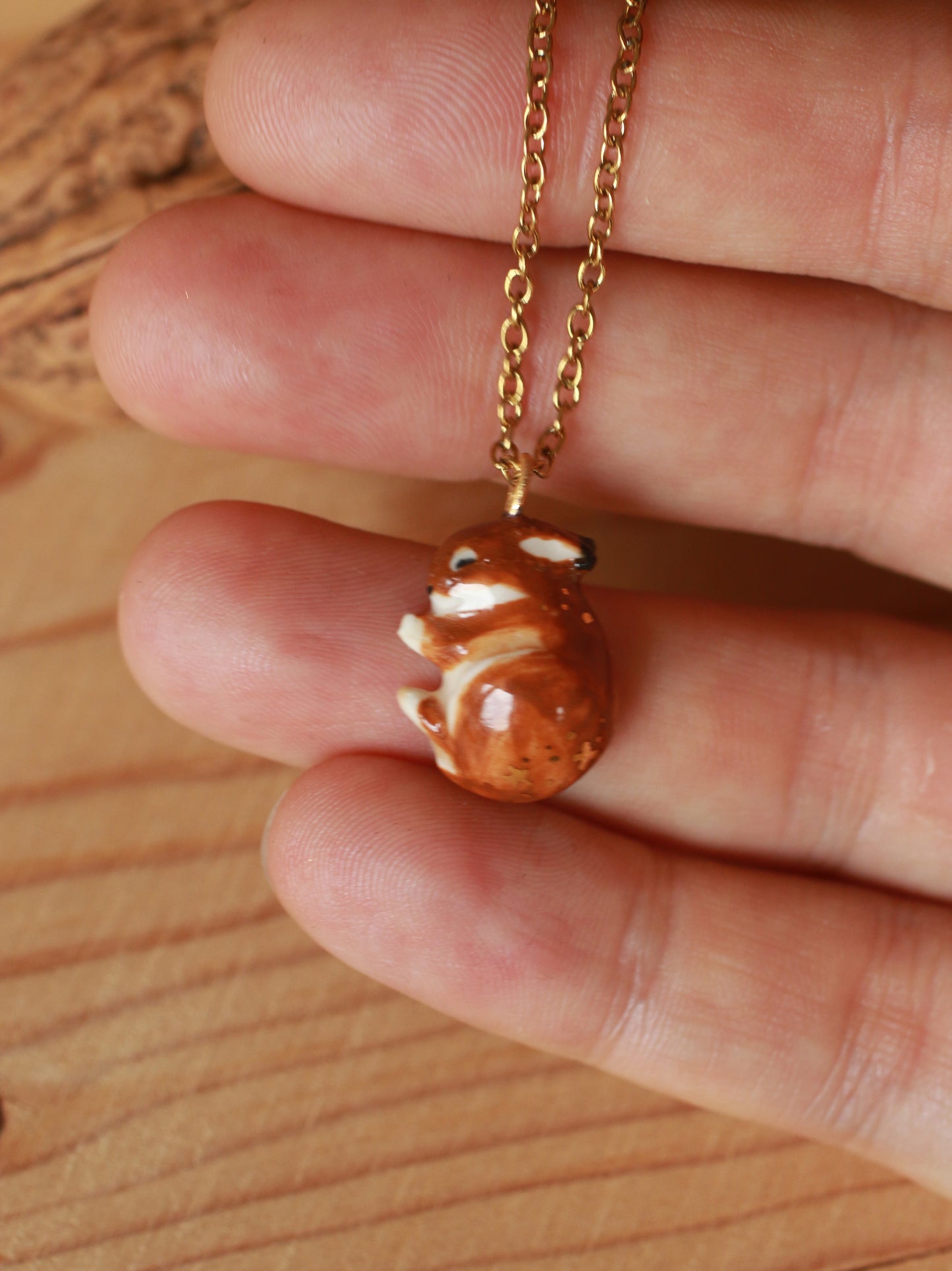 Sleeping bunny necklace in a walnut box