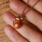 Sleeping bunny necklace in a walnut box