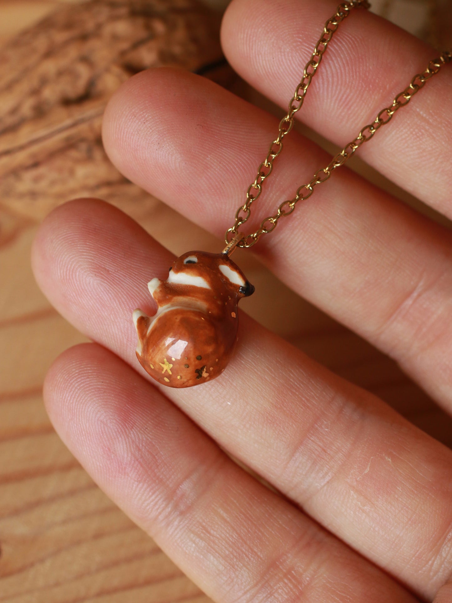 Sleeping bunny necklace in a walnut box