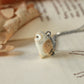 Barn owl necklace in a nutshell box