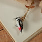 Woodpecker necklace