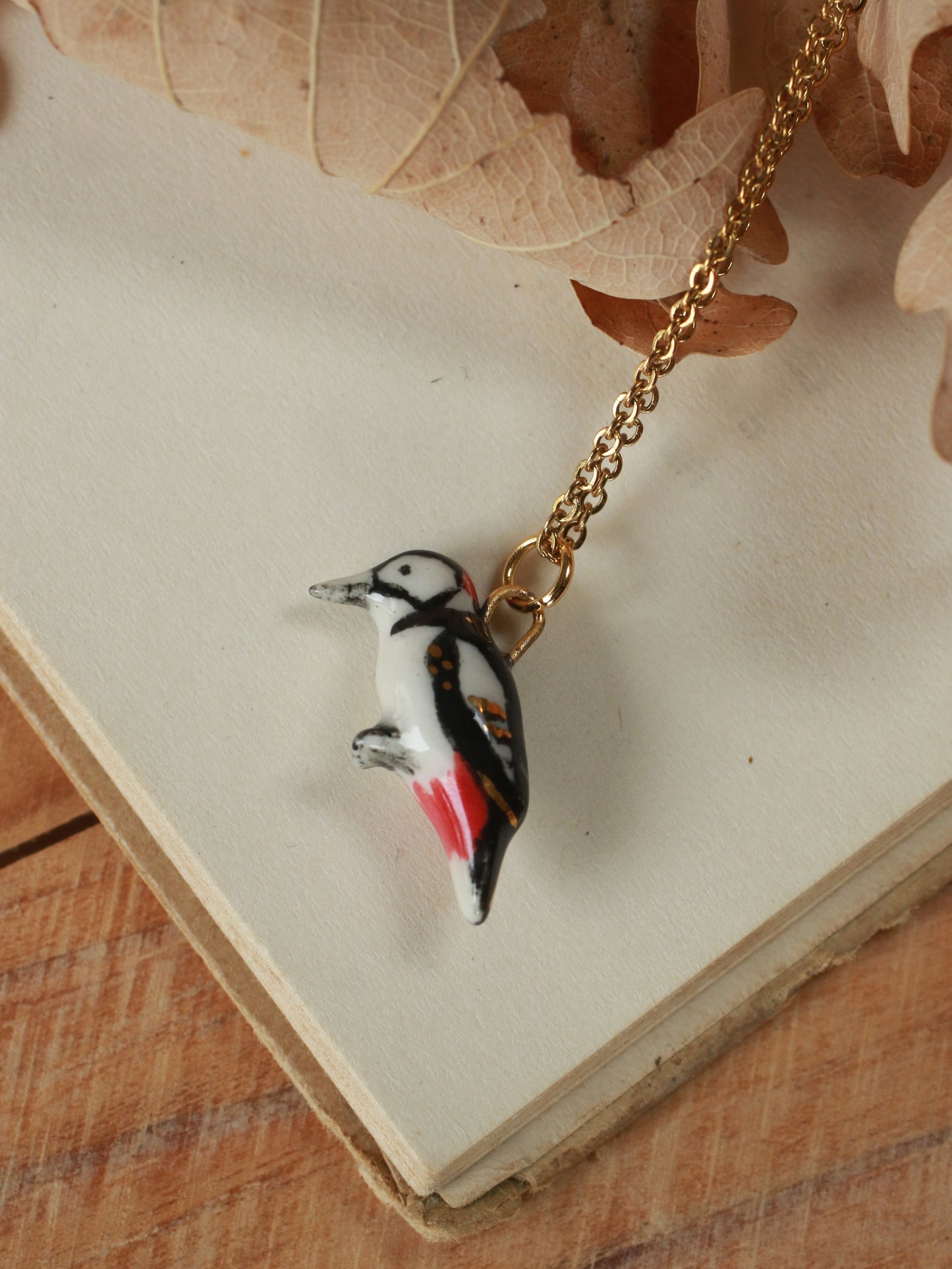 Woodpecker necklace