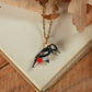 Woodpecker necklace