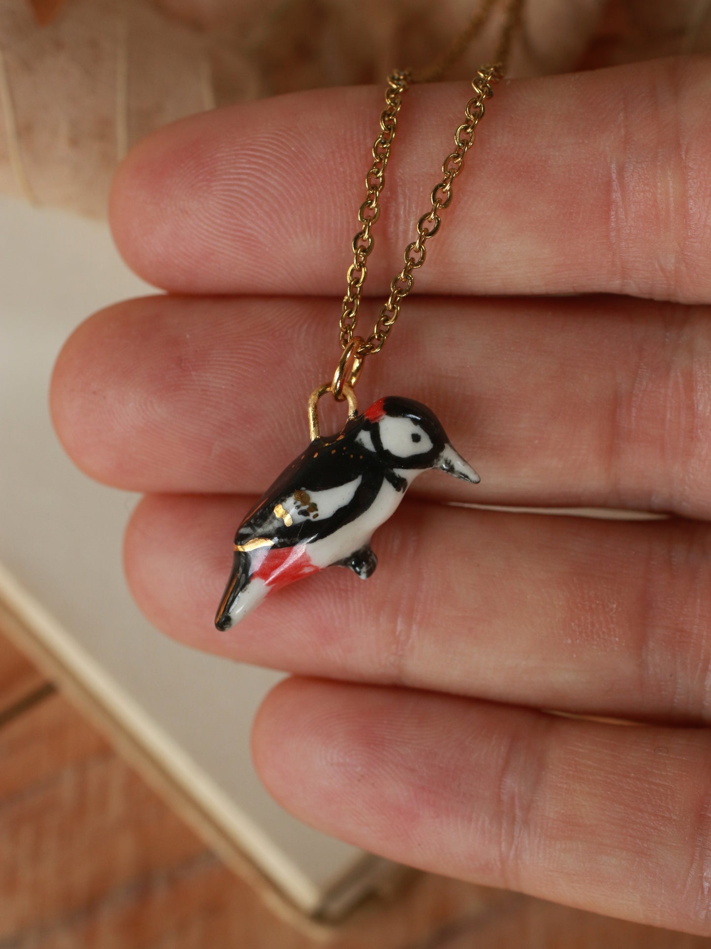 Woodpecker necklace