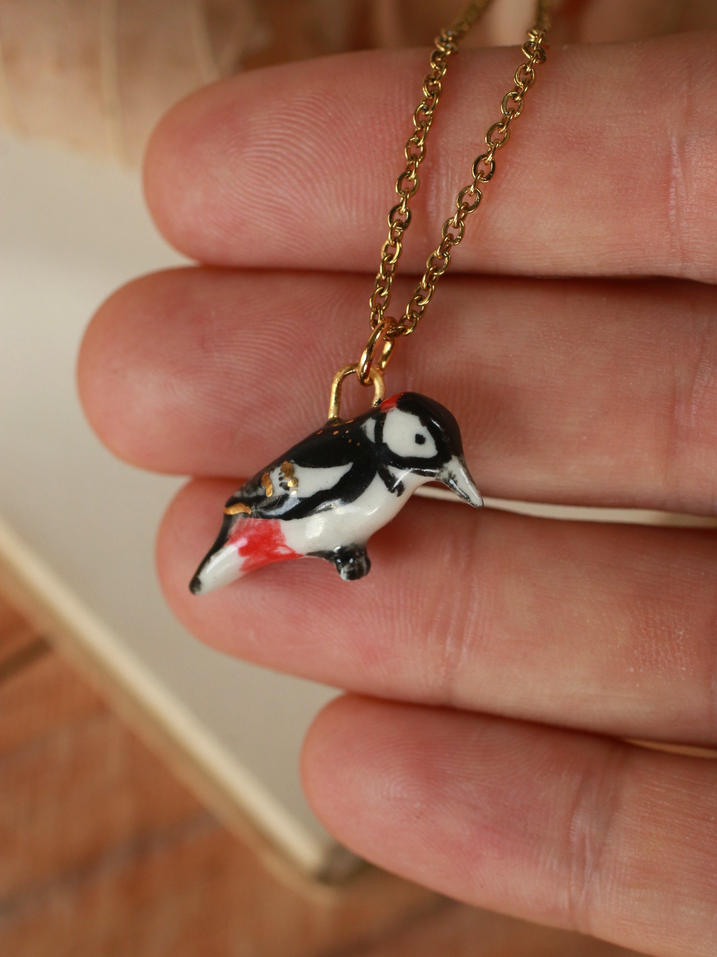 Woodpecker necklace