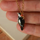 Woodpecker necklace