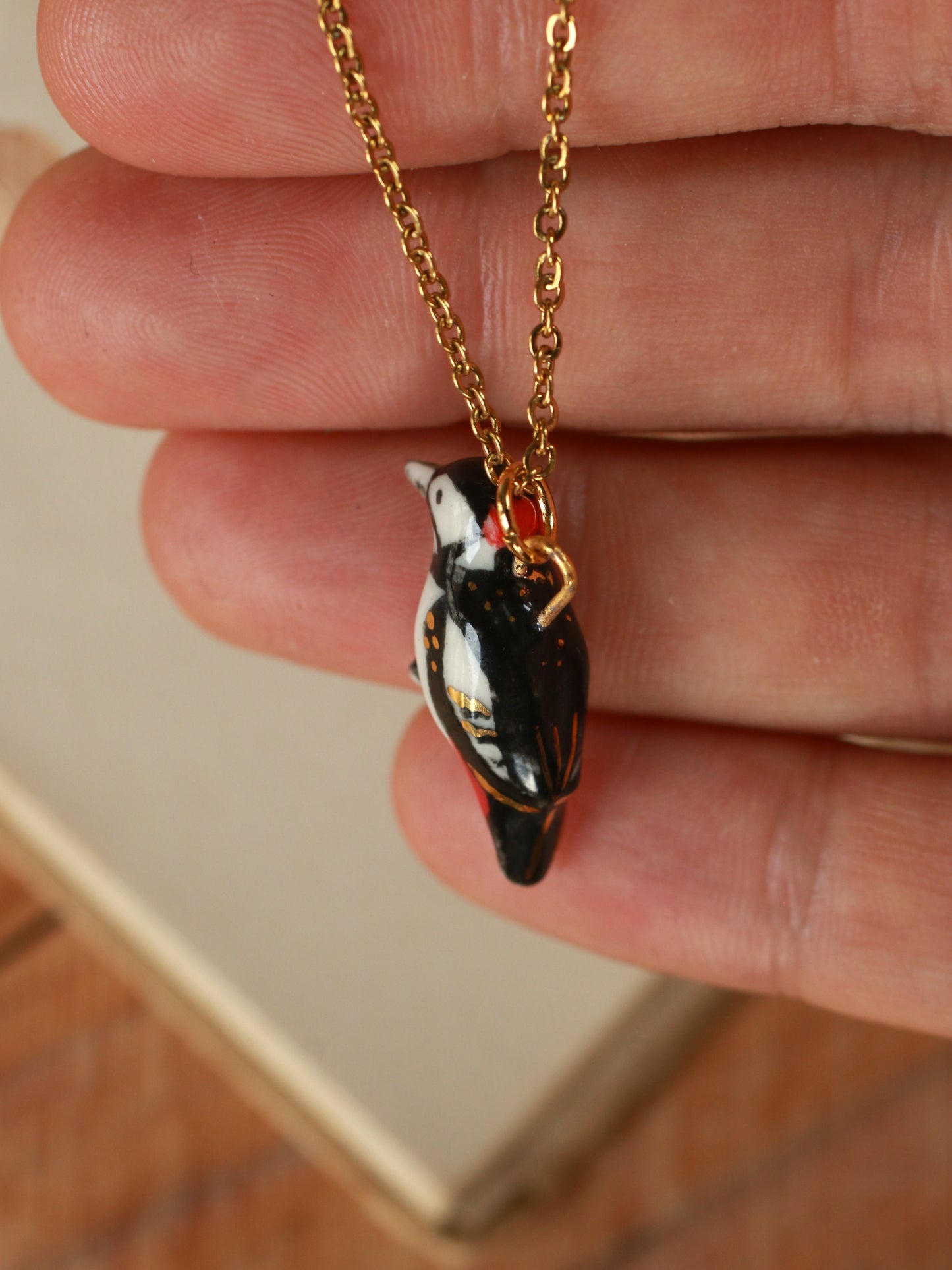 Woodpecker necklace