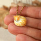 Sleeping orange tabby cat necklace