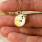 Sleeping orange tabby cat necklace
