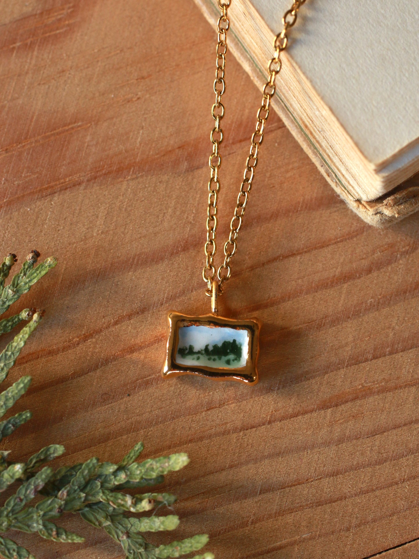 Tiny landscape painting necklace
