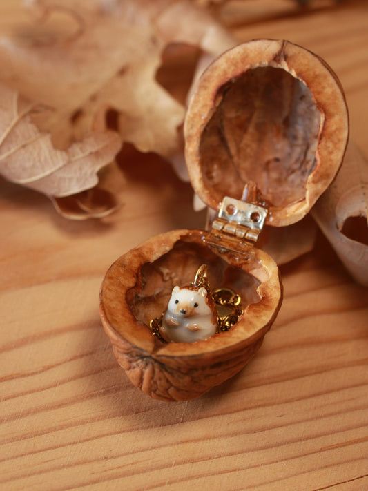 Hedgehog necklace in a walnut box