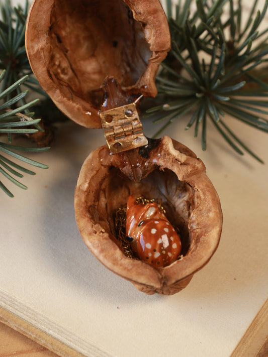 Sleeping Fawn necklace in a walnut box