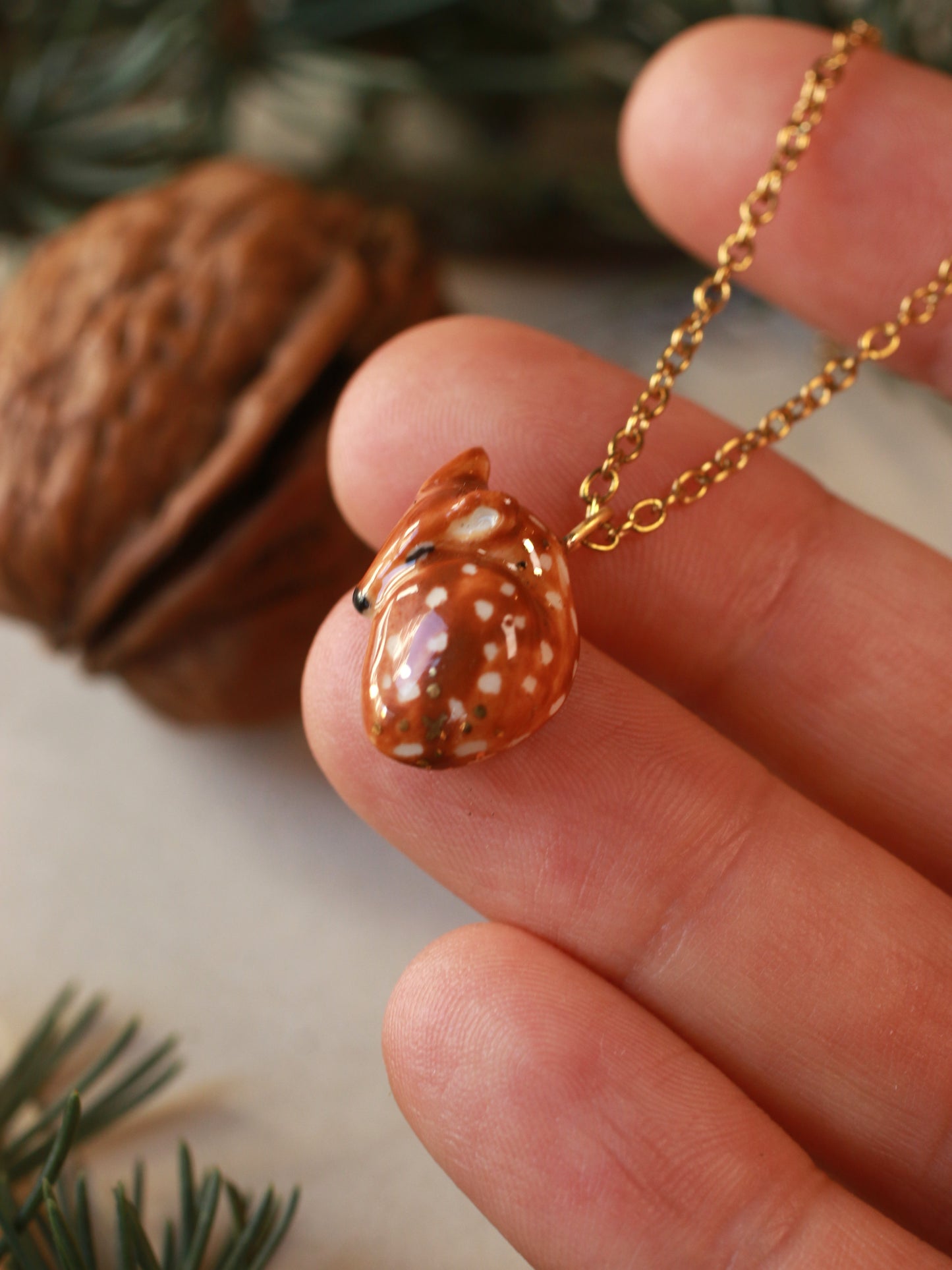 Sleeping Fawn necklace in a walnut box