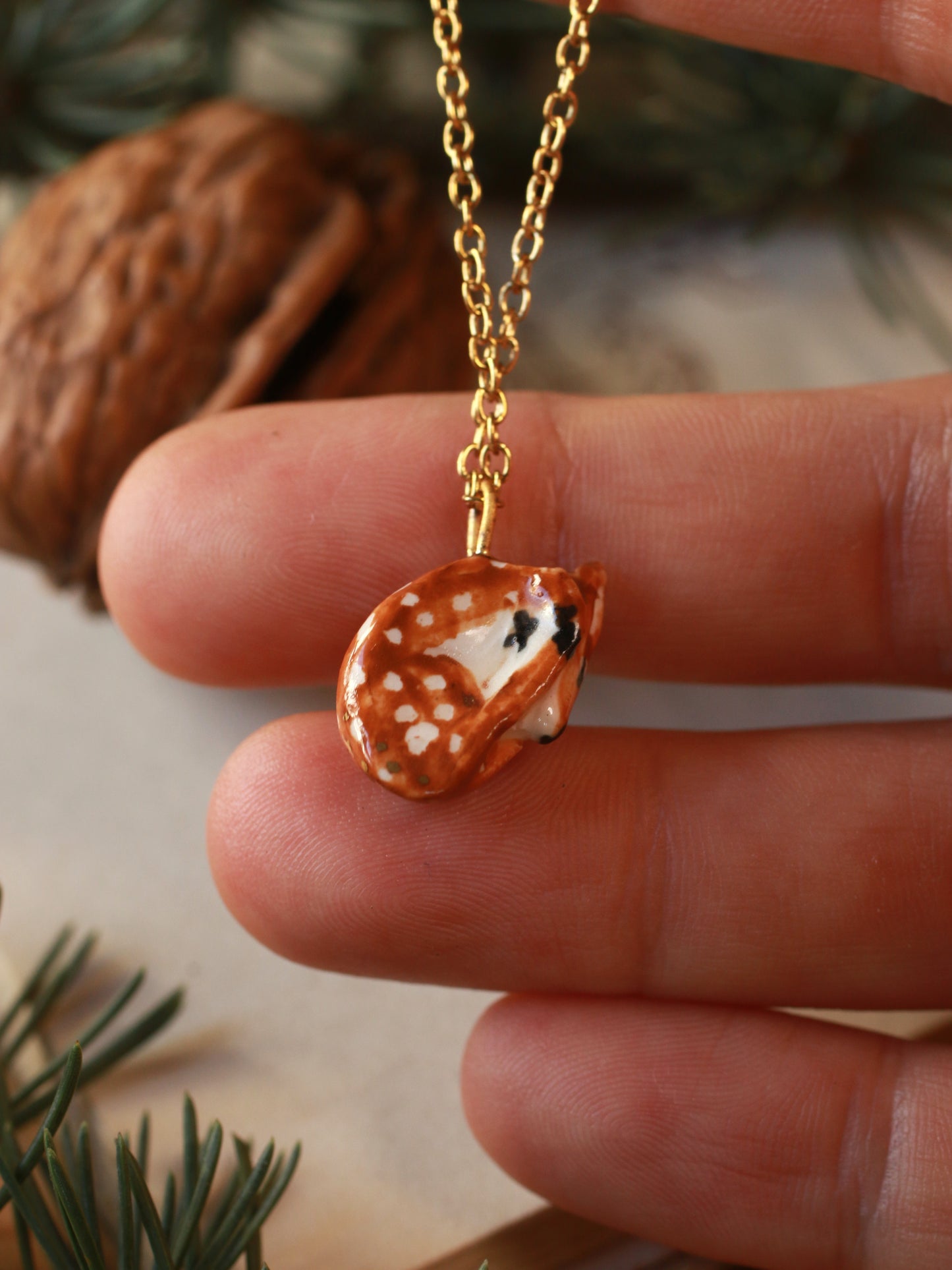 Sleeping Fawn necklace in a walnut box