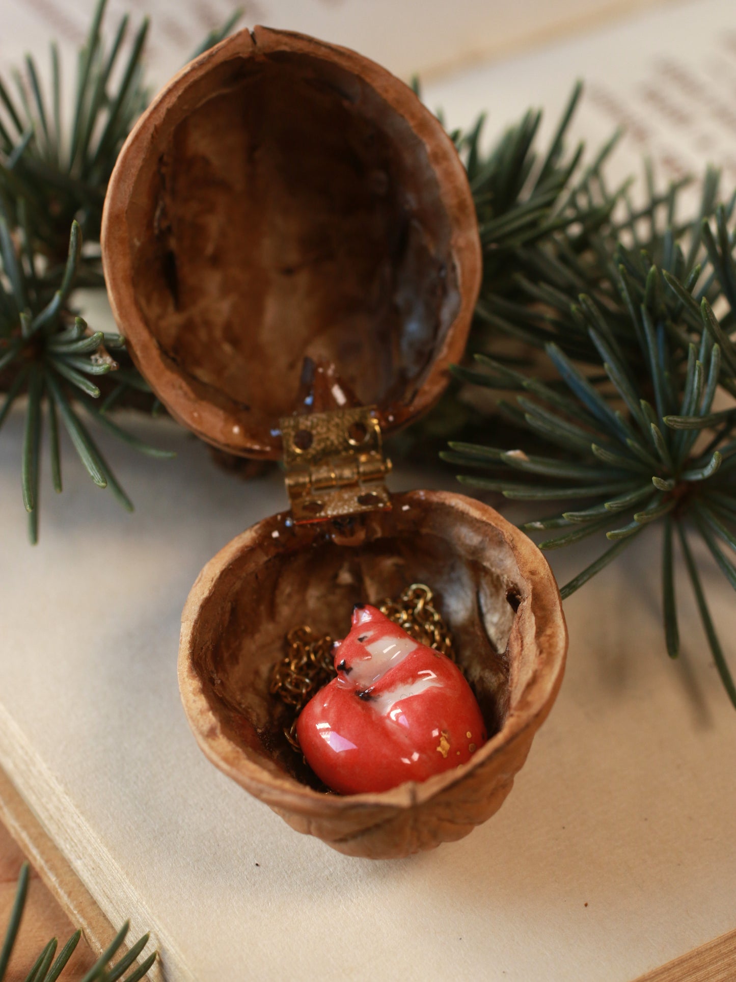 Sleeping squirrel necklace in a walnut box